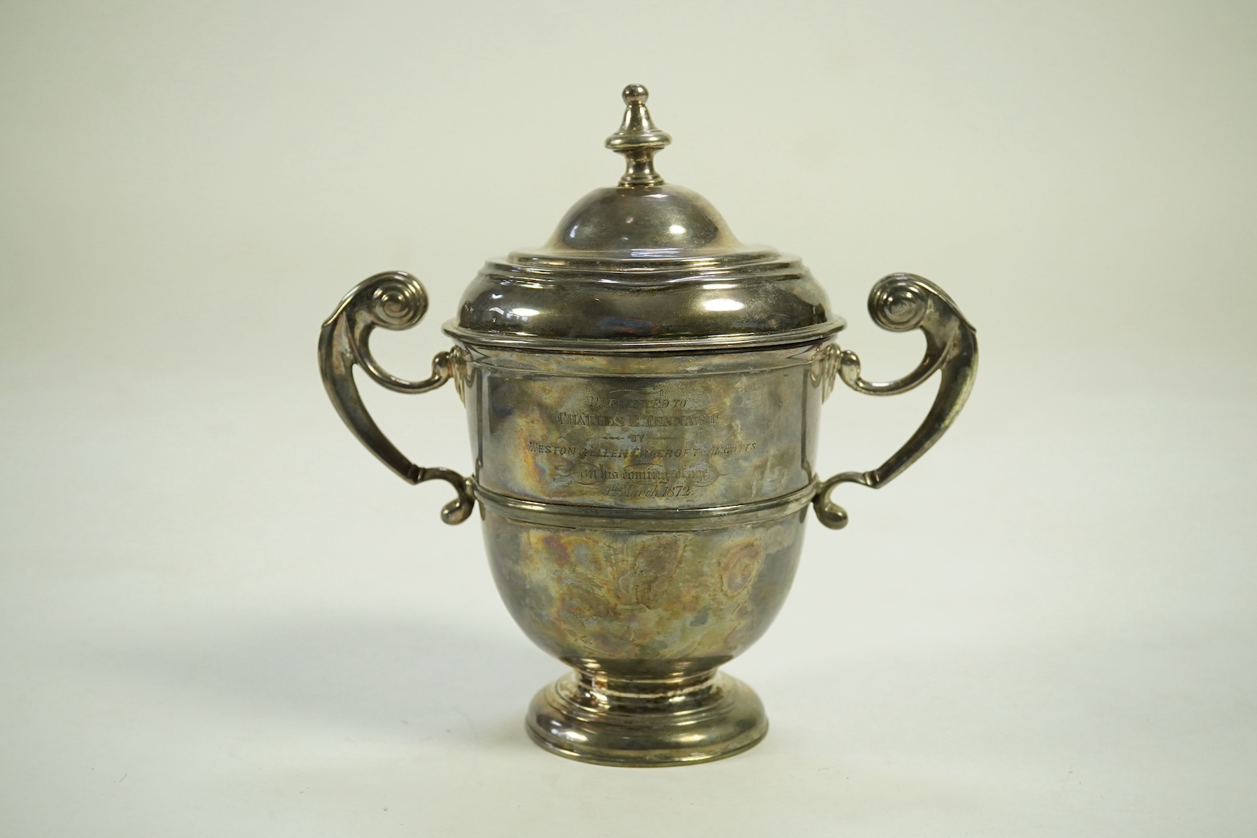 A George I Irish silver two handled cup by Philip Kinnersley, Dublin, 1719, with an earlier Queen Anne matched Irish silver cover by Joseph Walker, Dublin, 1704